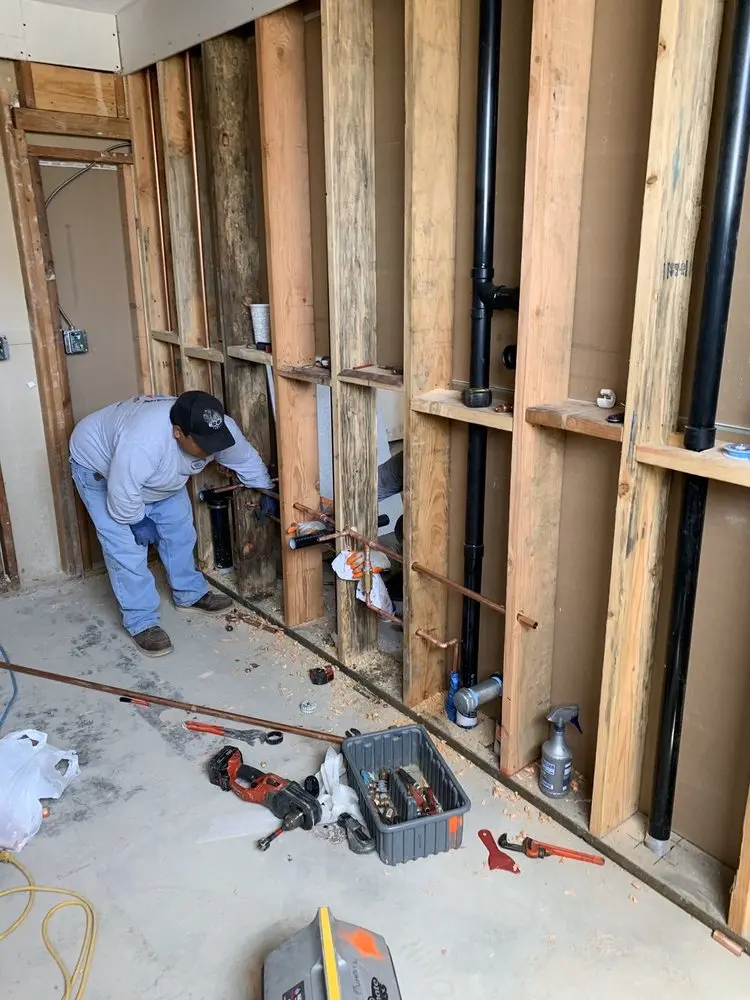 Commercial rough-in plumbing for Water Heater Replacement in Pine Log